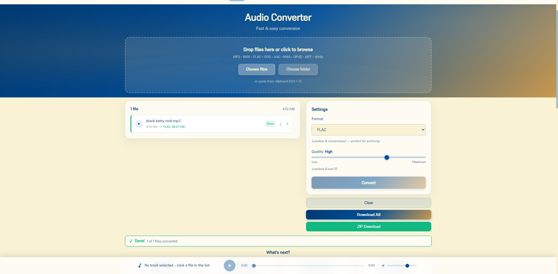 Screenshot of the KodiniTools Audio Converter with an uploaded audio file, format selection, and quality slider